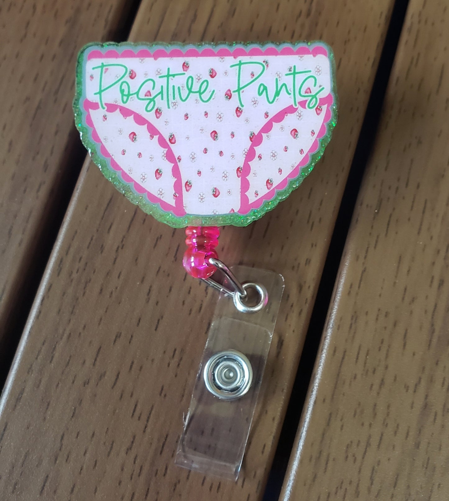 Positive Pants Badge Reel
