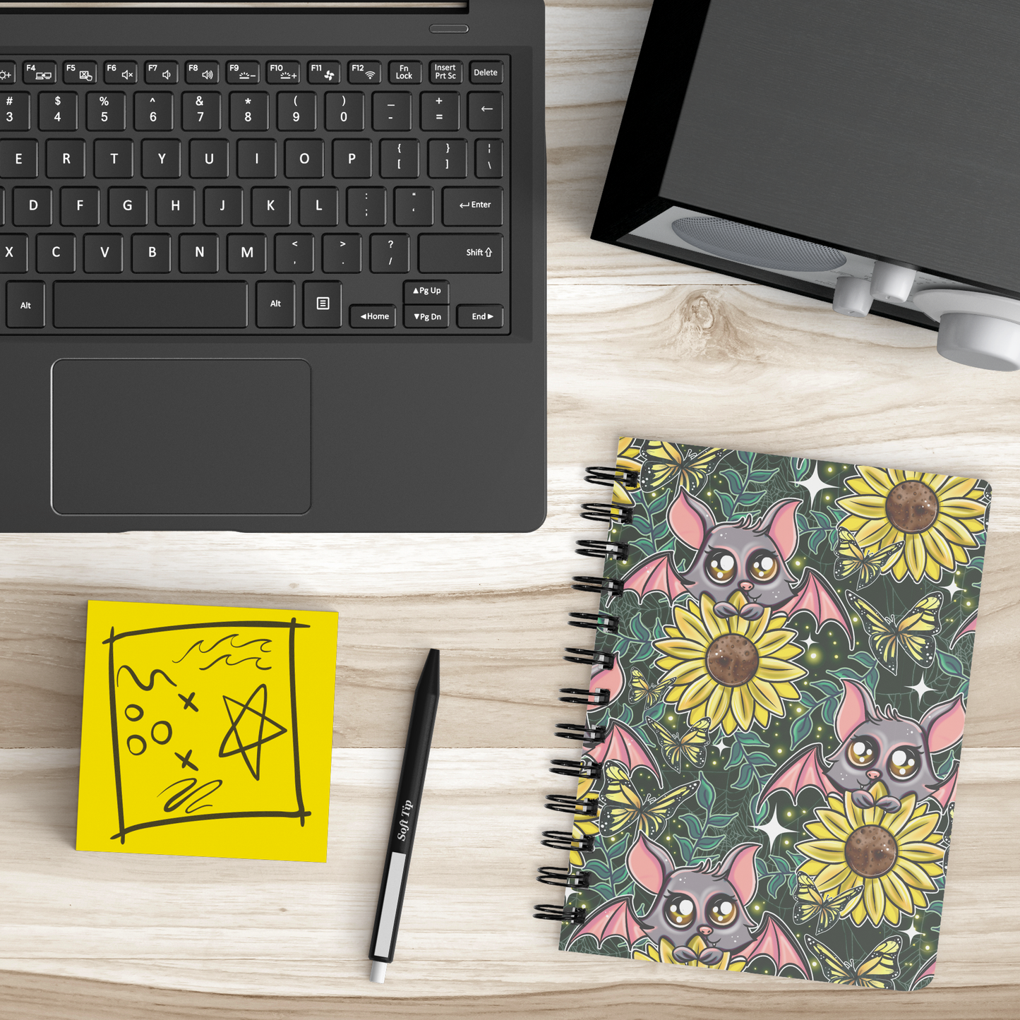 Sunflower_Bat_Notebook_SB_Lifestyle_Mockup.png