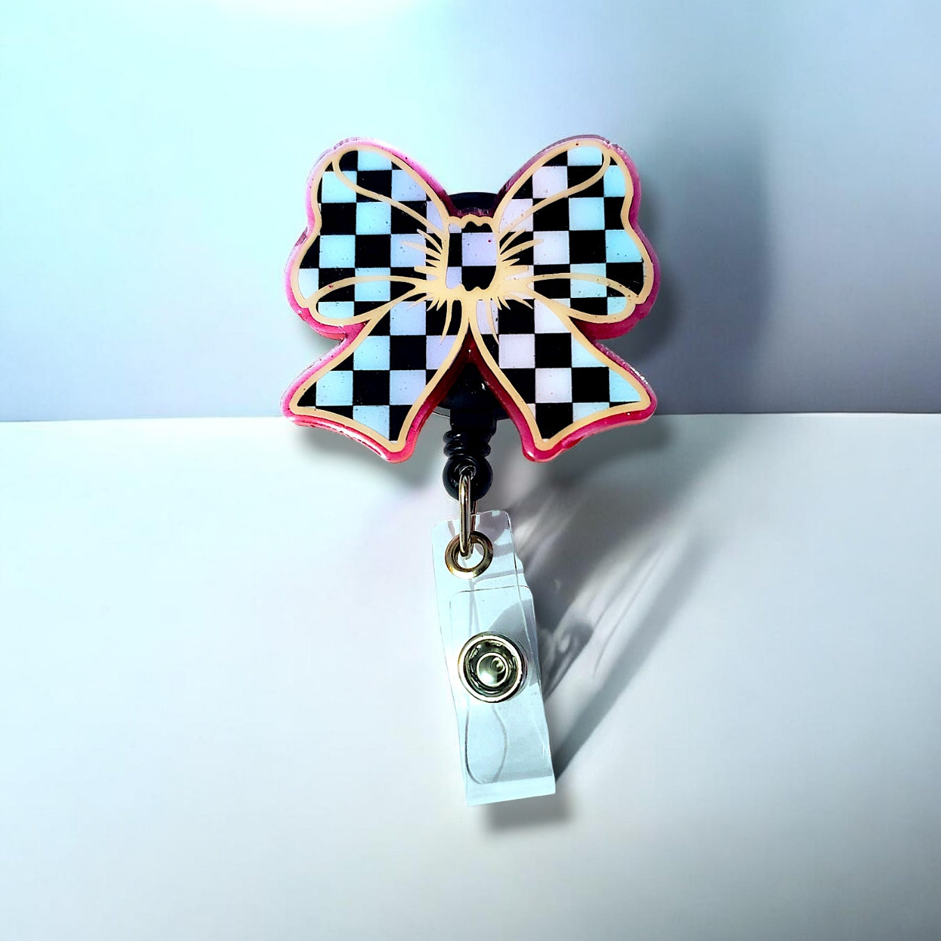 Checkered Bow Badge Reel